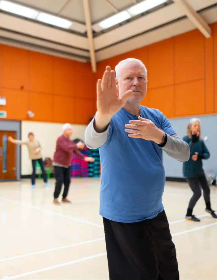 A man doing a workout class