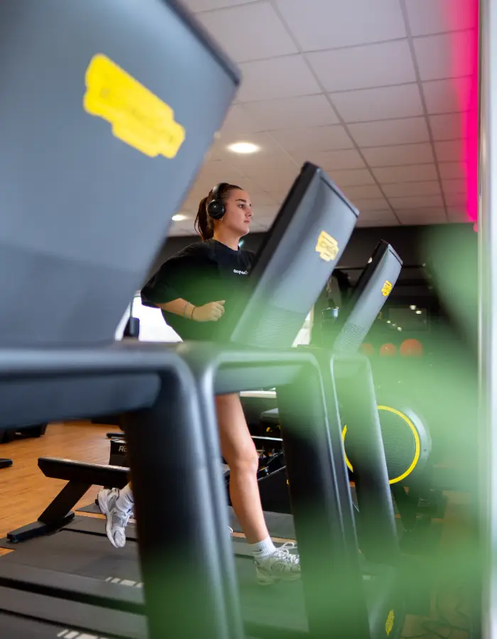 a women running on a treadmill