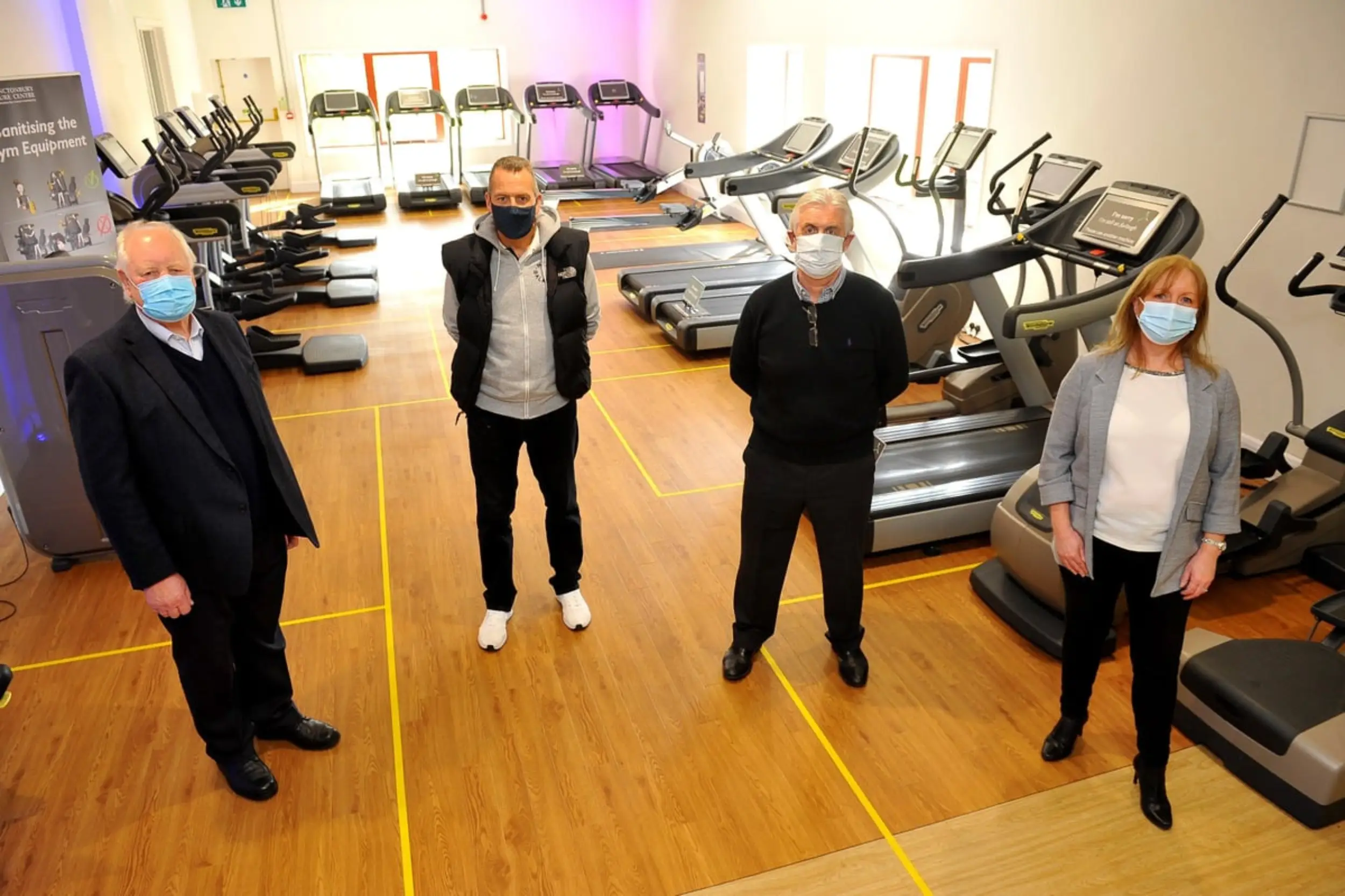 A image of people social distancing in the gym